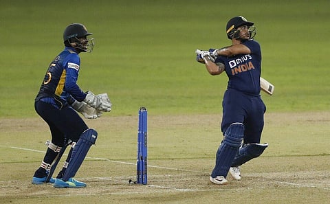 India's Ishan Kishan plays a shot as Sri Lankan wicketkeeper Minod Bhanuka watches. (Photo | AP)