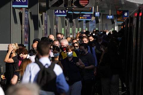 On what some have called 'Freedom Day', marking the end of coronavirus restrictions in England, commuters disembark from a train at London Bridge train station in London. (Photo | AP)