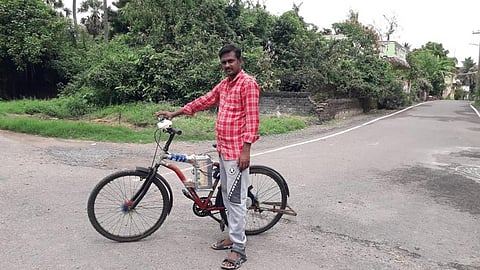 S Baskaran with his electric cycle. (Photo | Express)