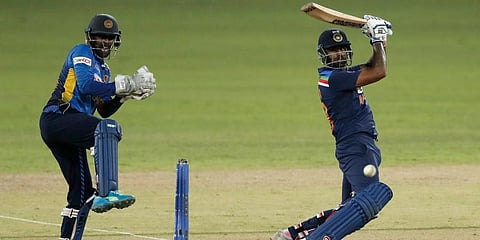 India's Suryakumar Yadav plays a shot as Sri Lanka's wicketkeeper Minod Bhanuka watches during the first ODI match in Colombo. (Photo | AP)