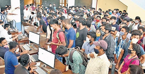 A huge number of students gathered for a mass vaccination drive held at Maharaja’s College centenary hall in Mysuru on Thursday | Udayshankar S