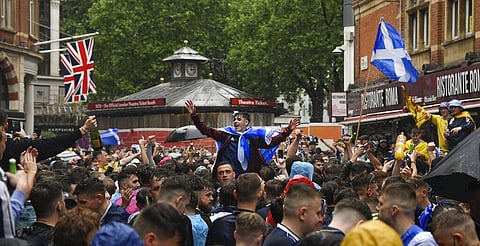 In this Friday, June 18, 2021 file photo Scotland fans later in Leicester Square. (Photo | AP)