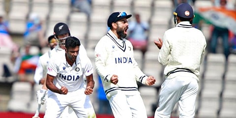 India's Ravichandran Ashwin (L) and teammates celebrate the dismissal of New Zealand's Devon Conway during the sixth day of the WTC final at the Rose Bowl in Southampton. (Photo | AP)