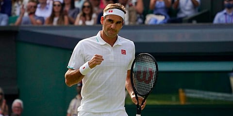 Switzerland's Roger Federer celebrates winning a point against Richard Gasquet of France at the Wimbledon. (Photo | AP)