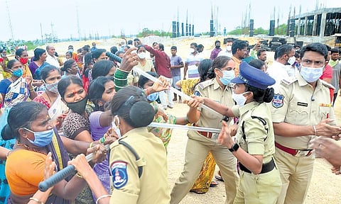 Police detain Congress workers who tried to stage a protest near the auctioned Kokapet lands on Monday.