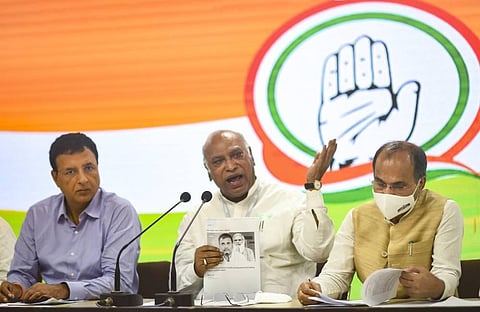 LoP Rajya Sabha Mallikarjun Kharge , LoP Lok Sabha Adhir Ranjan Choudhary and senior Congress leader Randeep Sujewala during a press conference, in New Delhi. (Photo | PTI)