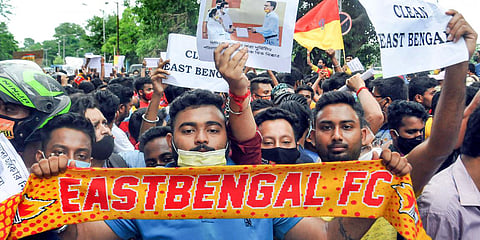 Fans during their protest against managing authorities of the East Bengal Club, near club premises in Kolkata. (Photo| PTI)