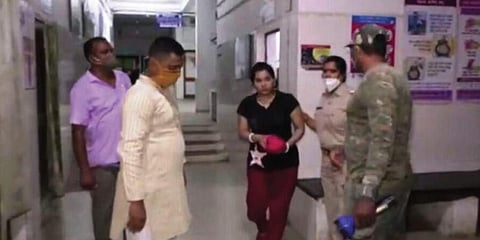 Bidya Bharati Panda, wife of the ACF, being taken for interrogation. (Photo | EPS)