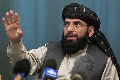 Suhail Shaheen, Afghan Taliban spokesman and a member of the negotiation team gestures while speaking during a joint news conference in Moscow, Russia. (Photo | AP)