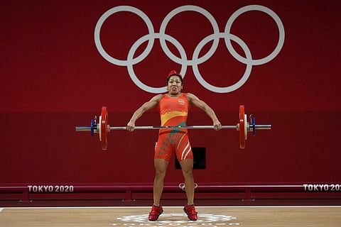 Mirabai Chanu Saikhom of India competes in the women's 49kg weightlifting event, at the 2020 Summer Olympics (Photo | AP)