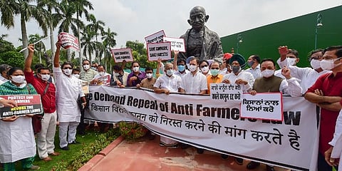 Congress leader Rahul Gandhi with other opposition members takes part in a protest against the farm reform laws, during the Monsoon Session of Parliament (Photo | PTI)