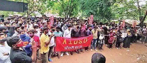 Students, under the banner of AIDSO, protest near the office of the Department of Technical Education in Bengaluru on Friday | Express