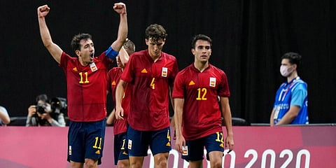 Mikel Oyarzabal (L)Â raises his arms in jubilation after scoring his side's first goal against Australia during a men's soccer match at the 2020 Summer Olympics in Sapporo, Sapporo, Japan. (Photo | AP)