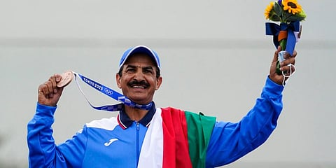 Bronze medalist Abdullah Alrashidi, of Kuwait, celebrates after the men's skeet at the Asaka Shooting Range in the 2020 Summer Olympics in Tokyo, Japan. (Photo | AP)