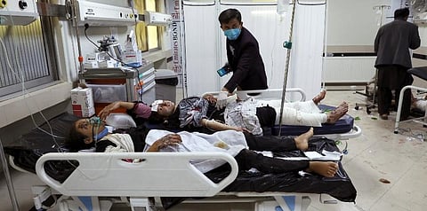 In this May 8, 2021 file photo, Afghan school students are treated at a hospital after a bomb explosion near a school in west of Kabul, Afghanistan. (File photo | AP)