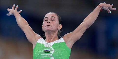 Oksana Chusovitina, of Uzbekistan, performs on the vault during the women's artistic gymnastic qualifications at the 2020 Summer Olympics in Tokyo. (Photo | AP)