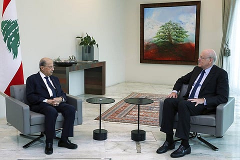 Lebanese President Michel Aoun, left, meets with former Lebanese Prime Minister Najib Mikati, at the presidential palace, in Baabda, east of Beirut. (Photo | AP)