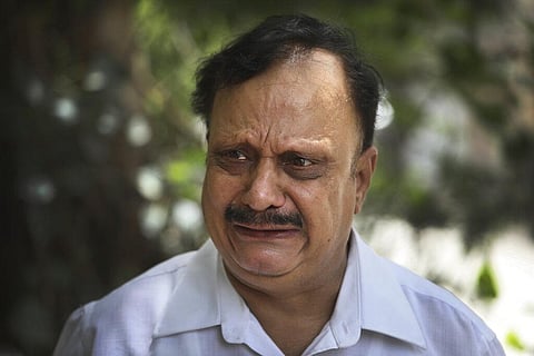 Anil Sharma breaks down while talking to the Associated Press after visiting his son, Saurav, who is being treated for COVID-19 at a private hospital, in New Delhi. (Photo | AP)