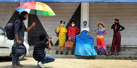 Fashion design students pose for photographs as part of their curriculum at Fort Kochi. (Photo | A Sanesh, EPS)