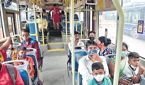 Commuters in a bus after ease in restrictions in Delhi on Monday | Shekhar yadav