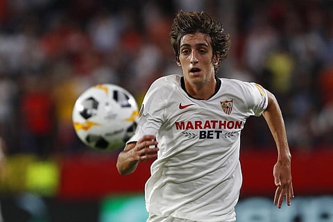 In this Thursday, Oct. 3, 20219 file photo, Sevilla's Bryan Gil goes for the ball during the Europa League group A soccer match between Sevilla and APOEL Nicosia. (Photo | AP)