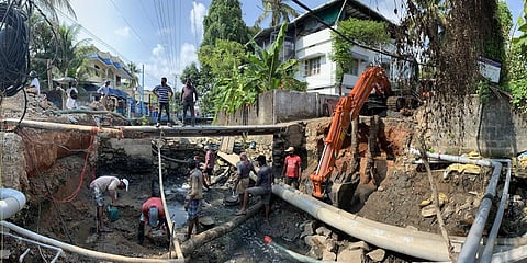Corporation workers reconstructing a culvert on the Thevara-Perandoor canal in Elamakkara | file photo