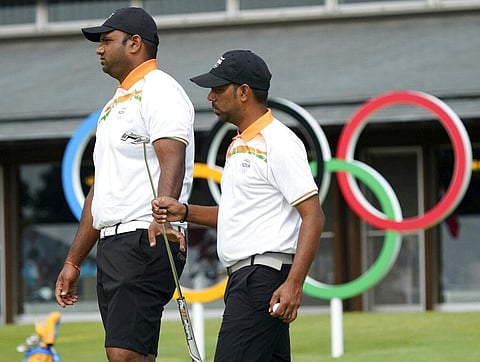 India's Udayan Mane, left, and his teammate Anirban Lahiri at the putting green during a practice session of the men's golf event at the 2020 Summer Olympics. (Photo | AP)