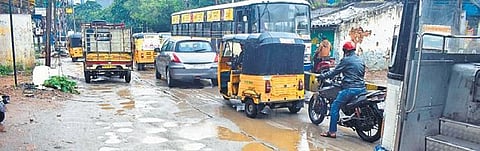 To make the roads motorable for motorists, it would take some time to fill the potholes as dry weather should prevail to take up the patching works. (Photo | Express)