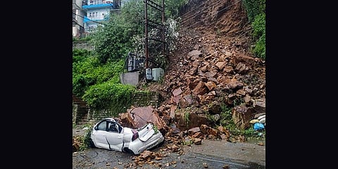 A car buried under the debris after a landslide due to heavy rainfall, at Vikasnagar in Shimla on Wednesday, July 28, 2021. (Photo | PTI)