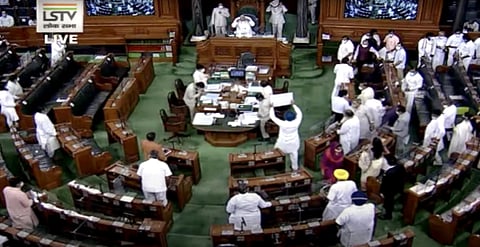 Opposition MPs create uproar in Lok Sabha during the Monsoon Session of Parliament. (Photo | ANI)