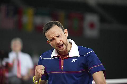 Kevin Cordon of Guatemala celebrates a point against Ka Long Angus of Hong Kong during men's singles group play stage Badminton match at the 2020 Summer Olympics. (Photo | AP)