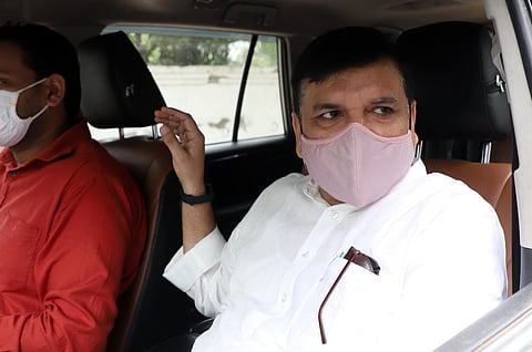 Aam Aadmi Party (AAP) MP Sanjay Singh leaves from Samajwadi party office after a meeting with party President Akhilesh Yadav, in Lucknow on Saturday. (Photo | ANI)