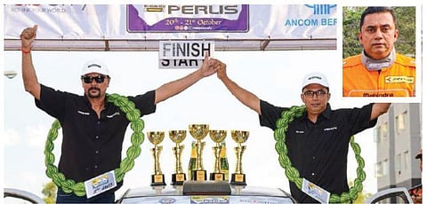 Musa Sharif (right and inset) with Karamjith Singh, Malaysia’s most-decorated rally driver, at the Rally of Perlis in 2018