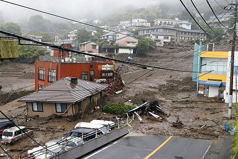 This photo shows buildings damaged by a mudslide at the Izusan district in Atami, west of Tokyo, Saturday, July 3, 2021, following heavy rains in the area. (Photo | AP)