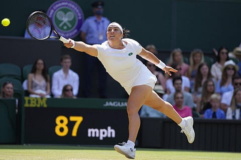 Tunisia's Ons Jabeur plays a return to Spain's Garbine Muguruza during the women's singles third round match on day five of the Wimbledon Tennis Championships. (Photo | AP)