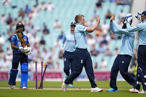 England's Sam Curran, third right, celebrates taking the wicket of Sri Lanka's Pathum Nissanka, left, during the second one day international cricket match. (Photo | AP)