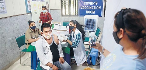 A beneficiary gets Covid-19 vaccination. (Photo | Shekhar Yadav, EPS)