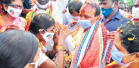 In this file photo, workers greet BJP leader Eatala Rajender during his padayatra. (Express)
