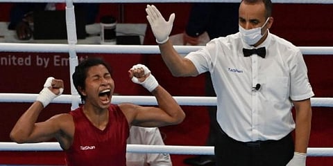Lovlina Borgohain celebrates after winning against Chinese Taipei's Nien-Chin Chen after their women's welter (64-69kg) quarter-final boxing match during the Tokyo 2020 Olympic Games. (Photo | AFP)