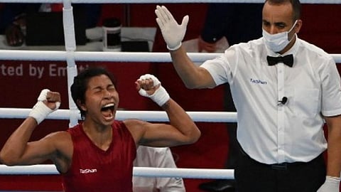 Lovlina Borgohain celebrates after winning against Chinese Taipei's Nien-Chin Chen after their women's welter (64-69kg) quarter-final boxing match during the Tokyo 2020 Olympic Games.