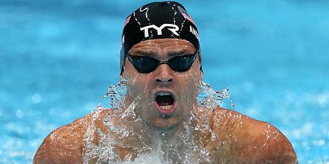 Michael Andrew of the United States swims in a men's 200-meter individual medley semifinal at the 2020 Summer Olympics in Tokyo, Japan. (Photo | AP)