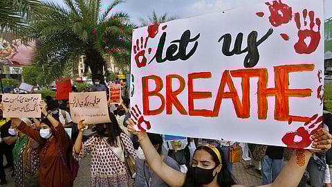 Women's rights activists take part in a demonstration against gender violence.