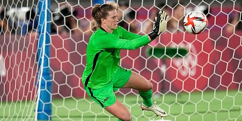 US' goalkeeper Alyssa Naeher stops a ball in a the penalty shootout against Netherlands during a women's quarterfinal match at the 2020 Summer Olympics in Yokohama, Japan. (Photo | AP)