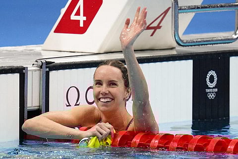 Emma Mckeon, of Australia, celebrates after winning the gold medal in the women's 100-meter freestyle final at the 2020 Summer Olympics. (Photo | AP)