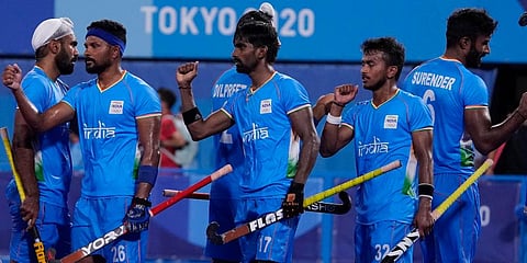India players celebrate after defeating Japan during a men's field hockey match at the 2020 Summer Olympics in Tokyo, Japan. (Photo | AP)