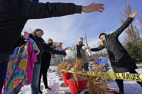 Shortly after the border closed in March 2020, people from both countries traveled to Derby Line to hold impromptu family reunions from their own side of the border. (Photo | AP)