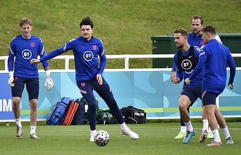 England's goalkeeper Jordan Pickford, Harry Maguire, Jordan Henderson, Harry Kane and Kieran Trippier during a training session. (Photo | AP)