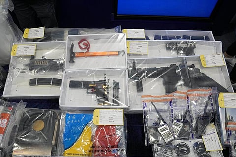 Confiscated evidence is displayed during a news conference as nine people were arrested over the alleged plot to plant bombs around Hong Kong, (Photo | AP)