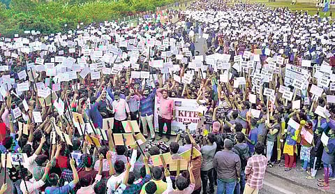 Kitex employees holding protest at the unit’s ground at Kizhakkambalam in Kochi on Monday | A Sanesh
