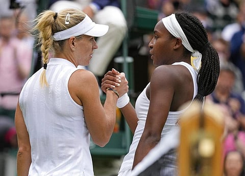 Germany's Angelique Kerber, left, greets Coco Gauff of the U.S. after winning the women's singles fourth round match on day seven of the Wimbledon. (Photo | AP)